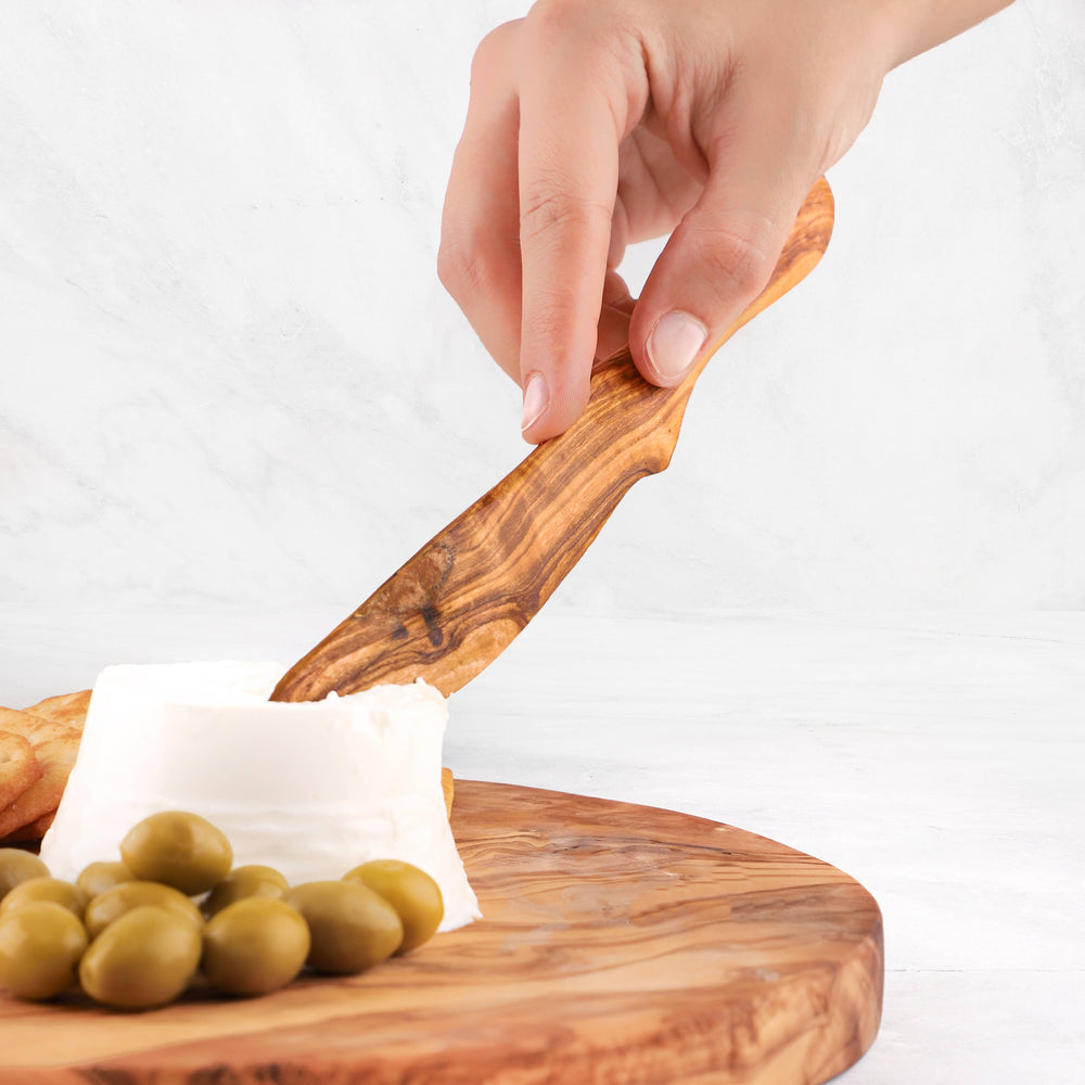 
                  
                    Olive Wood Spreader – Handmade Curved Serving Tool
                  
                