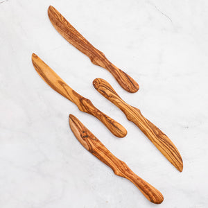 
                  
                    Olive Wood Spreader – Handmade Curved Serving Tool
                  
                