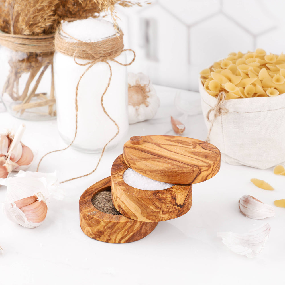 
                  
                    Handmade Olive Wood Salt & Pepper Cellar – Double Layer
                  
                